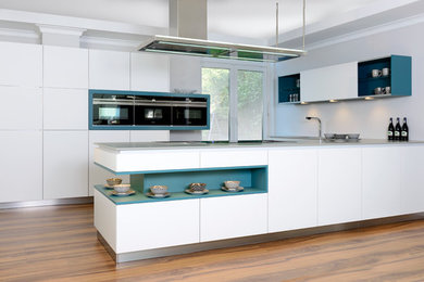 This is an example of a contemporary kitchen in Manchester.