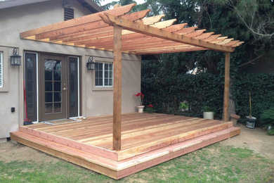 Example of a trendy home design design in Other