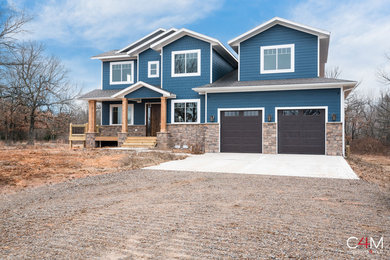 Example of a cottage blue exterior home design in Other