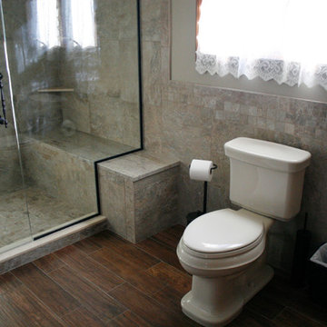 Spacious Master Bath with Sliding Barn Door in Troy
