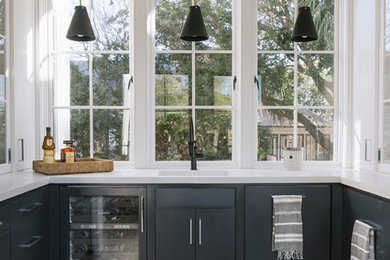 Inspiration for a coastal home bar remodel in Charleston
