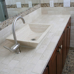 Island Stone random tile bathroom shower and sink - Tile