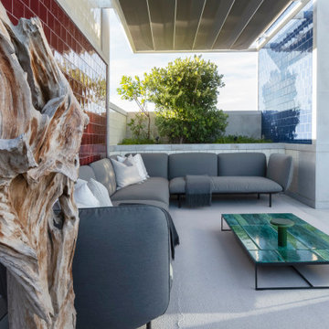 Rooftop Terrace with Driftwood Piece and Grey Sofa, Lisbon