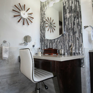 Master Bathroom with dressing table, washer and dryer.