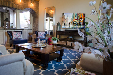 Example of a mid-sized eclectic home design design in Phoenix