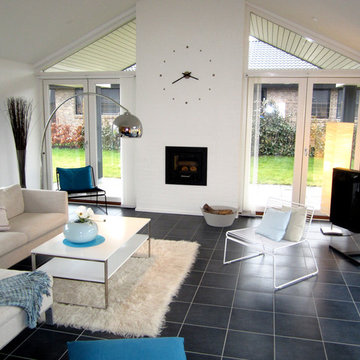 Wall clock above fireplace