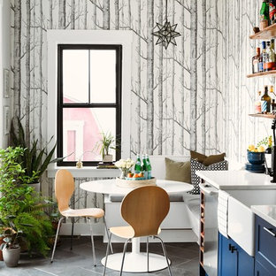 Klassisches Esszimmer mit Schieferboden in Sonstige