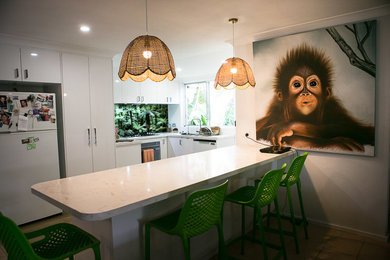 This is an example of a mid-sized modern kitchen in Perth.