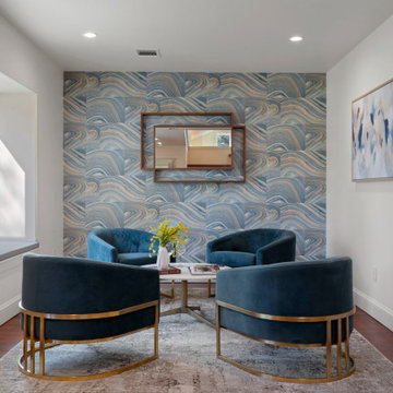 Memorial Villages sitting room with hand-finished wave-pattern accent wall and n