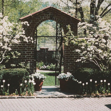 Brick Arched Garden Entry Dogwood Trees