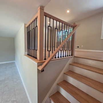 Modern Wood and Metal Railing with Black Window Balusters