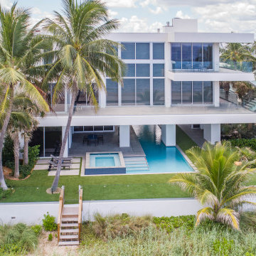Custom Swimming Pool & Spa That Goes Underneath Part of the The House