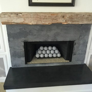 Custom Board formed fireplace surround and concrete hearth
