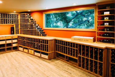 Inspiration for a large eclectic light wood floor wine cellar remodel in Los Angeles