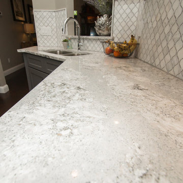 Kitchen | Two-Tone Cabinets | Cambria Quartz | Arabesque Marble Backsplash