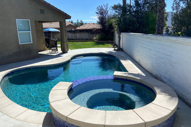 Island style pool photo in Los Angeles