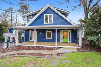 Large country blue two-story concrete fiberboard exterior home idea in Atlanta with a mixed material roof