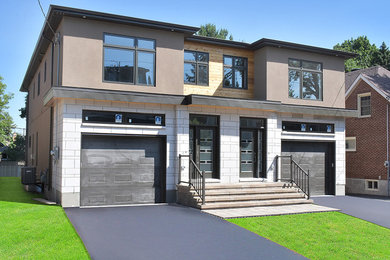 Example of an exterior home design in Ottawa