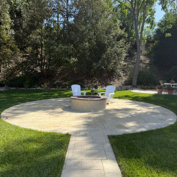 Custom Circular Fire Pit Patio with Stamped Concrete | Outdoor Living Thousand O