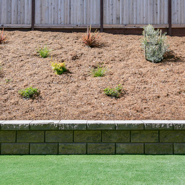 Grass and Pavers Backyard Design Ideas