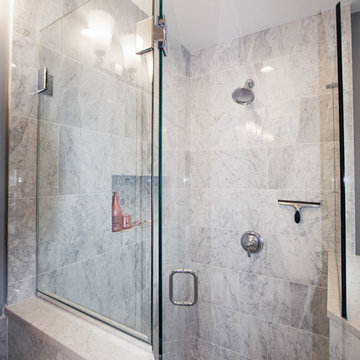 Walk-In Marble Shower in Glass Enclosure