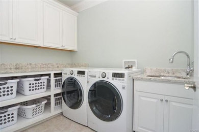 Transitional laundry room photo in Other