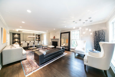 Inspiration for a large contemporary enclosed and formal dark wood floor and gray floor living room remodel in DC Metro with gray walls, a standard fireplace, a stone fireplace and no tv