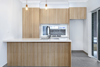 Photo of a modern kitchen in Wollongong.