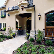 Exterior almond parex stucco, navy blue shutters