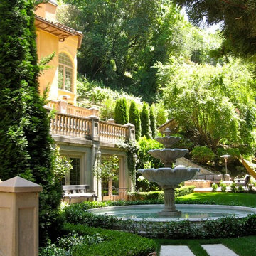 Beyond a brick archway, a formal entry garden reveals a hidden world.