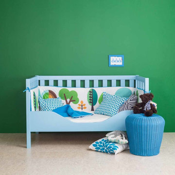 Ein Babybett in sechzehn Farben