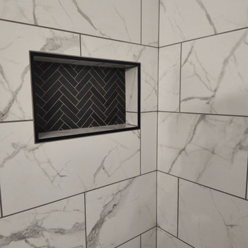 Custom Tile Tub Surround with Black Herringbone Mosaics