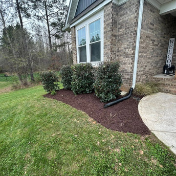 Custom Turf Landscape Area with Stone Border