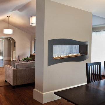See-Through Fireplace Separating Dining and Living Room - White Mountain Hearth