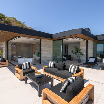 Outdoor Living Space with Seamless Stone Cladding