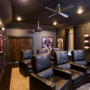Home theater - traditional home theater idea in Houston with gray walls
