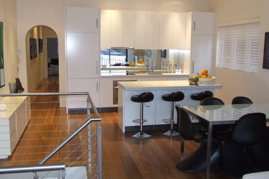 Example of a trendy kitchen design in Sydney
