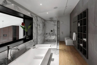Inspiration for a mid-sized modern master gray tile and marble tile marble floor, gray floor and double-sink bathroom remodel with open cabinets, a one-piece toilet, gray walls, a vessel sink, marble countertops, white countertops and a floating vanity