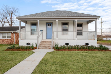 Example of an arts and crafts exterior home design in New Orleans