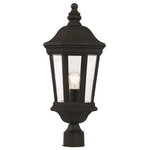 Trans Globe Lighting - Westfield Postmount Lantern, 22.25" - The Westfield 22.25" Postmount Lantern adds charming character to your home's exterior. The postmount lantern sets a warm and inviting tone for an outdoor living area while providing ample lighting. The Westfield Collection combines traditional design themes with functionality. The single light postmount lantern is a hexagon shape. The cast iron frame has a curved top and a curved bottom. Vertical metal strips divide the Clear Glass panels.