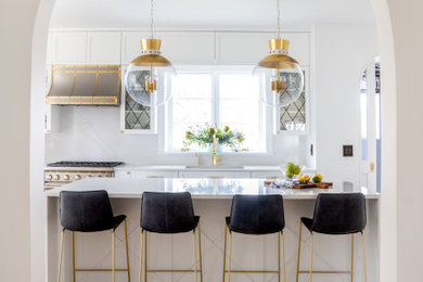 Inspiration for a large timeless l-shaped light wood floor and beige floor enclosed kitchen remodel in New York with an undermount sink, recessed-panel cabinets, white cabinets, quartzite countertops, white backsplash, quartz backsplash, paneled appliances, an island and white countertops