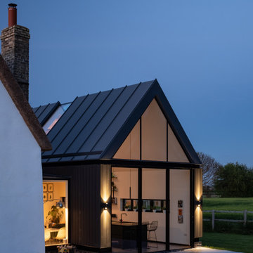 Listed Building repairs and contemporary extension  Great Eversden