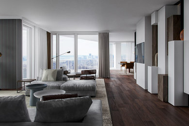 Example of a large trendy open concept dark wood floor and red floor living room design in New York with white walls and a wall-mounted tv