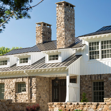 American Farmhouse with Board and Batten and Rustic Stone