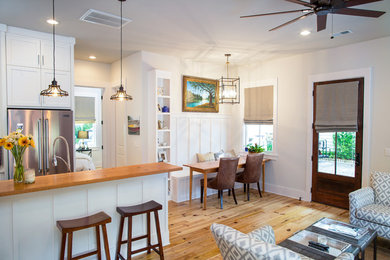 Example of a small beach style dining room design in Charleston