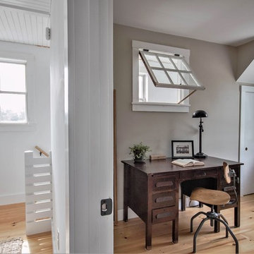 split view of bedroom and stair hall.