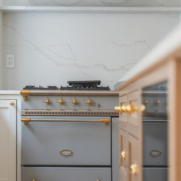Château Charm: French-Inspired Kitchen Renovation with Plaster Hood Blue Stove a