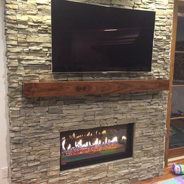 Stone Fireplaces and Wood Mantles