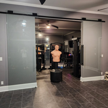 Installation of double glass doors in the basement (gym)