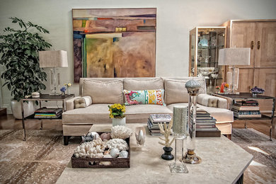 Inspiration for a large formal and open concept light wood floor living room remodel in Dallas with beige walls, a standard fireplace and a tile fireplace